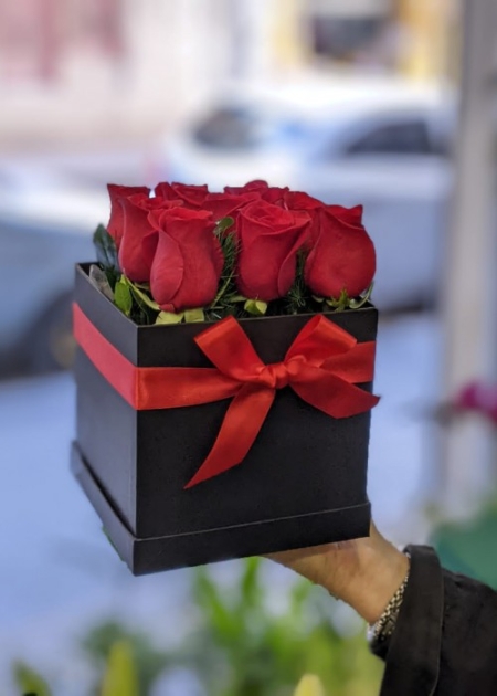 Caja con 9 rosas